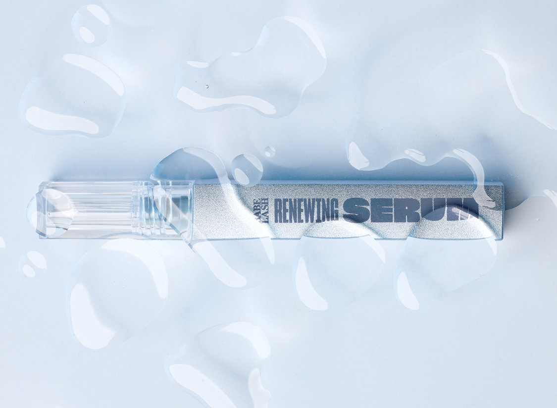 Renewing Serum bottle with a light blue background
